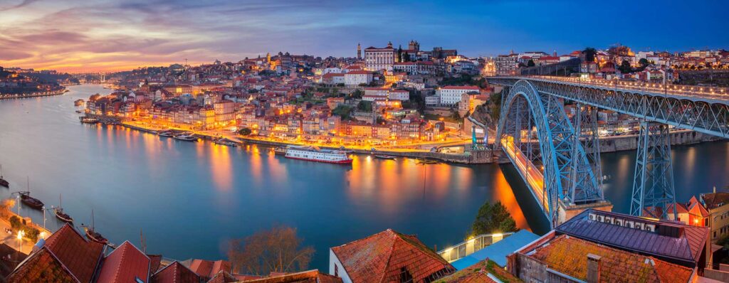 Portugal citizenship by descent Golden Visa PDC Porto bridge